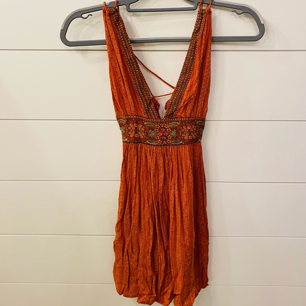 Women’s Tunic Top. Size Small. Orange with stitched detail.